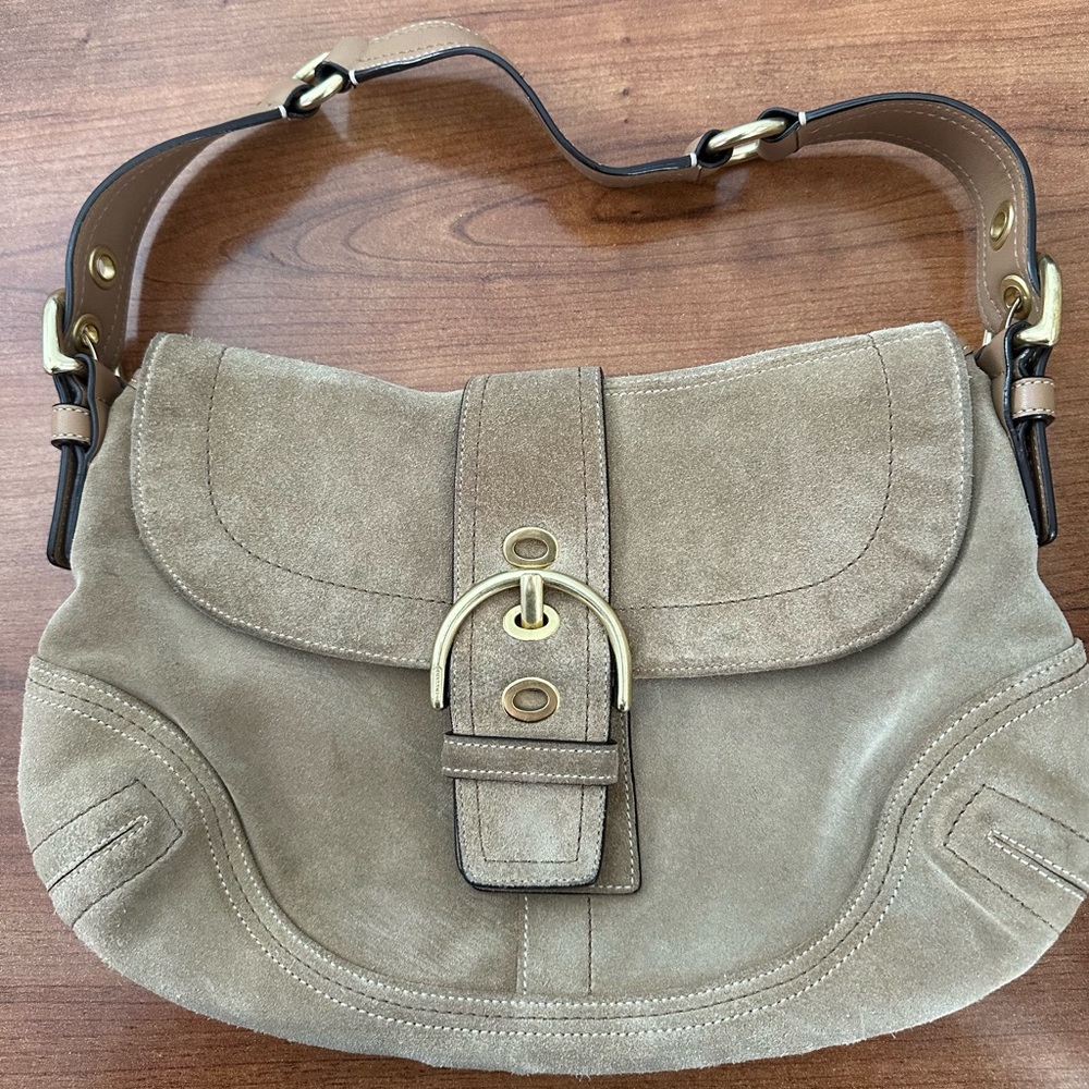 Tan suede Coach Soho handbag. Minor wear and tear but in overall great shape.
